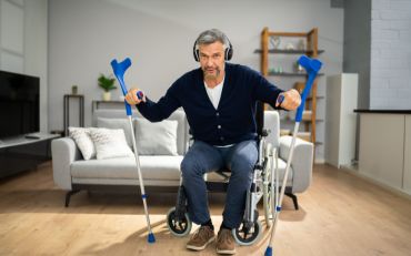 Man standing from wheelchair